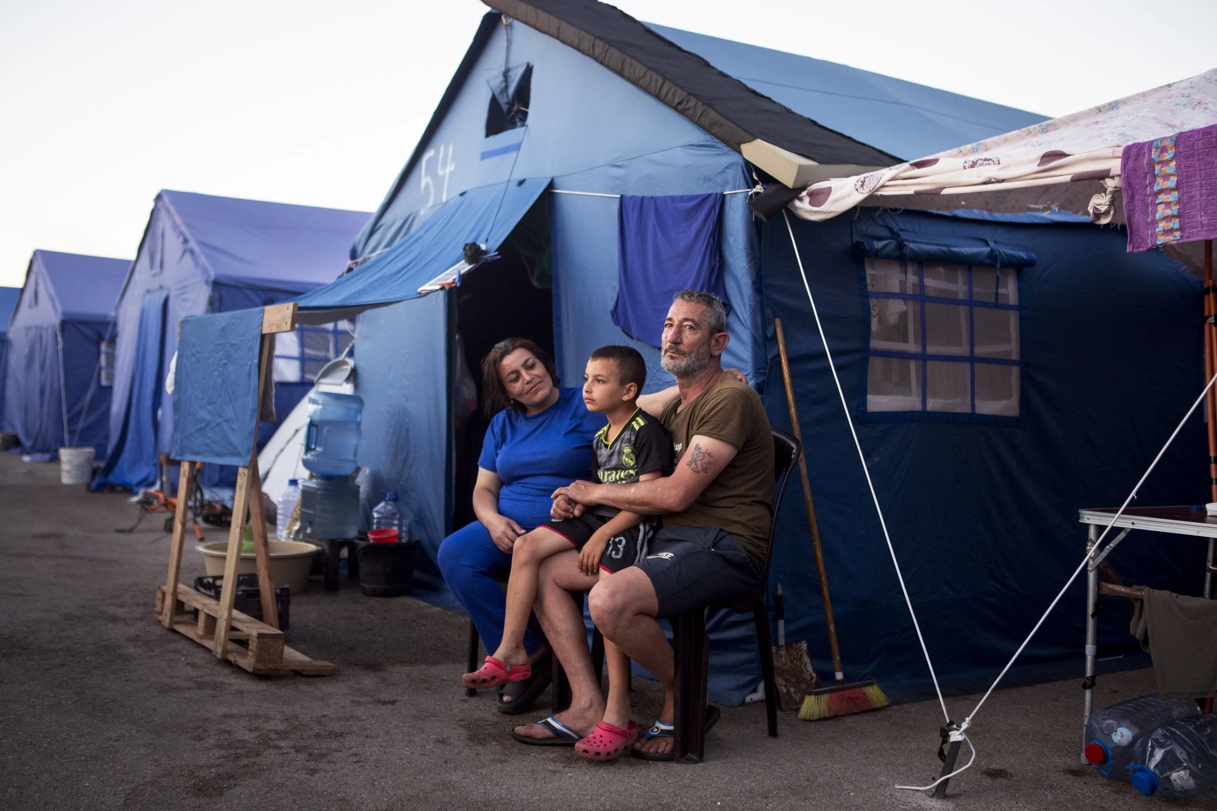 Jamal, Fatme and Adam photographed outside of their tent located in Biel, Beirut. They are originally from Sour.

 
