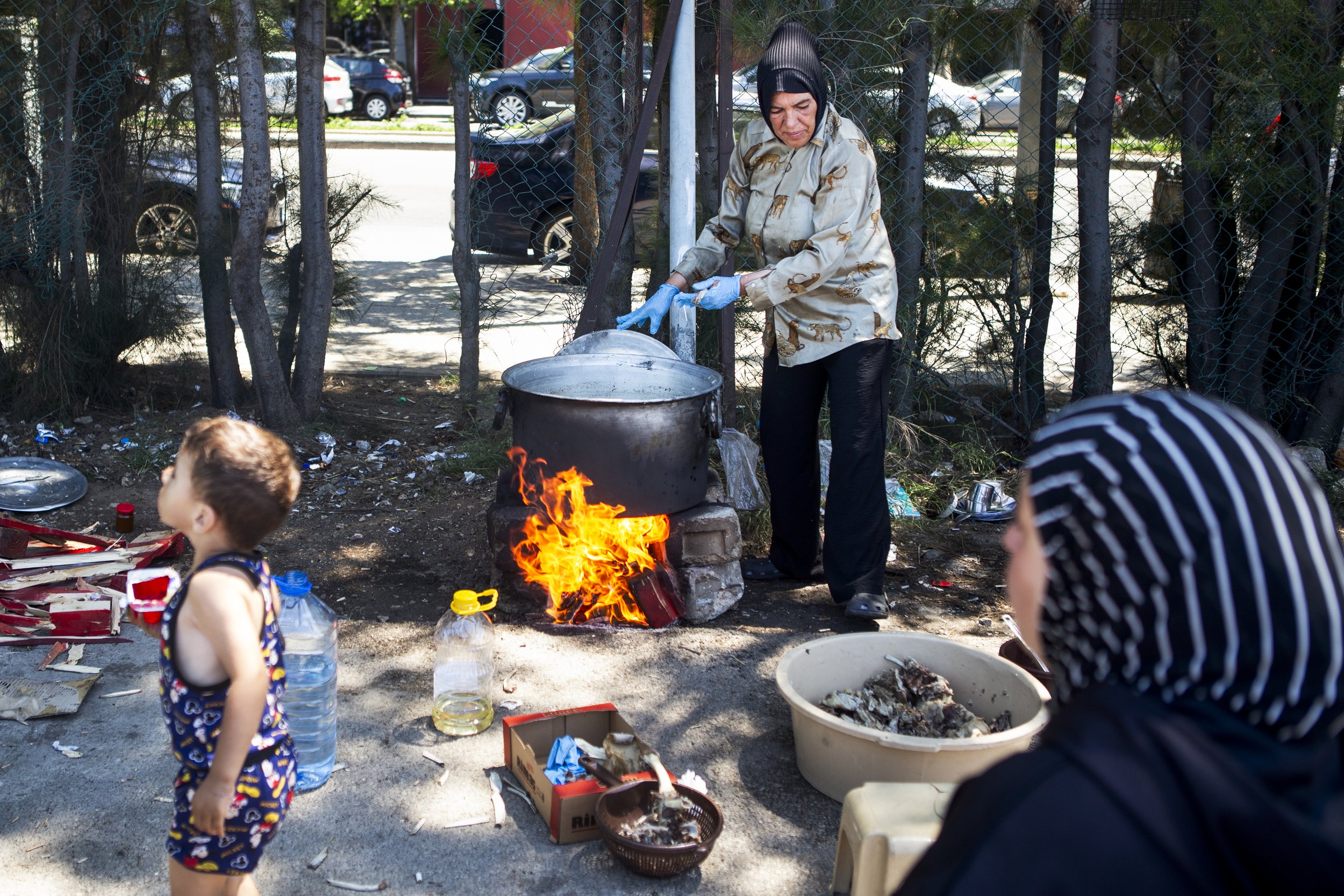 Samira, cooks for the entire camp Mansaf with donated meat and rice gathered from people in the camp. Many of those displaced are without work and have little money relying on the kindness of their neighbours or aid for support.