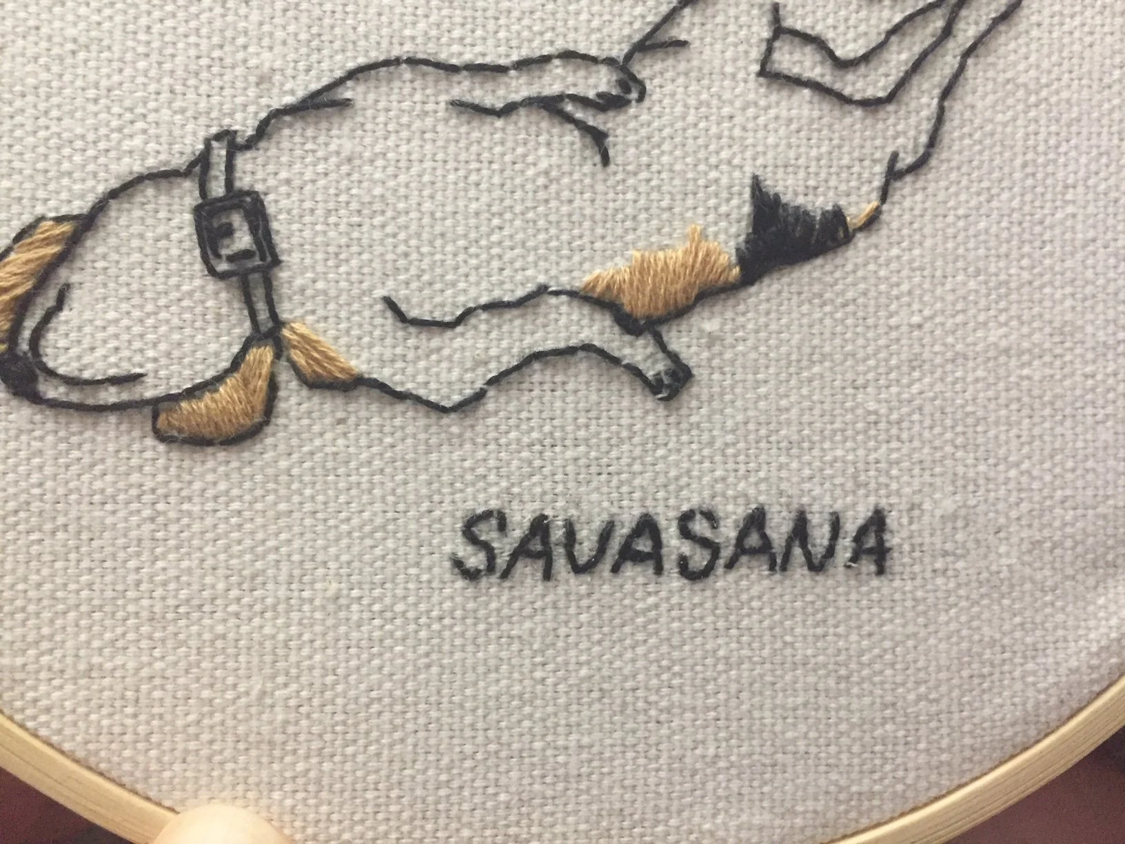 Relaxing yoga-themed embroidery kit with beagle and girl in corpse pose..jpg