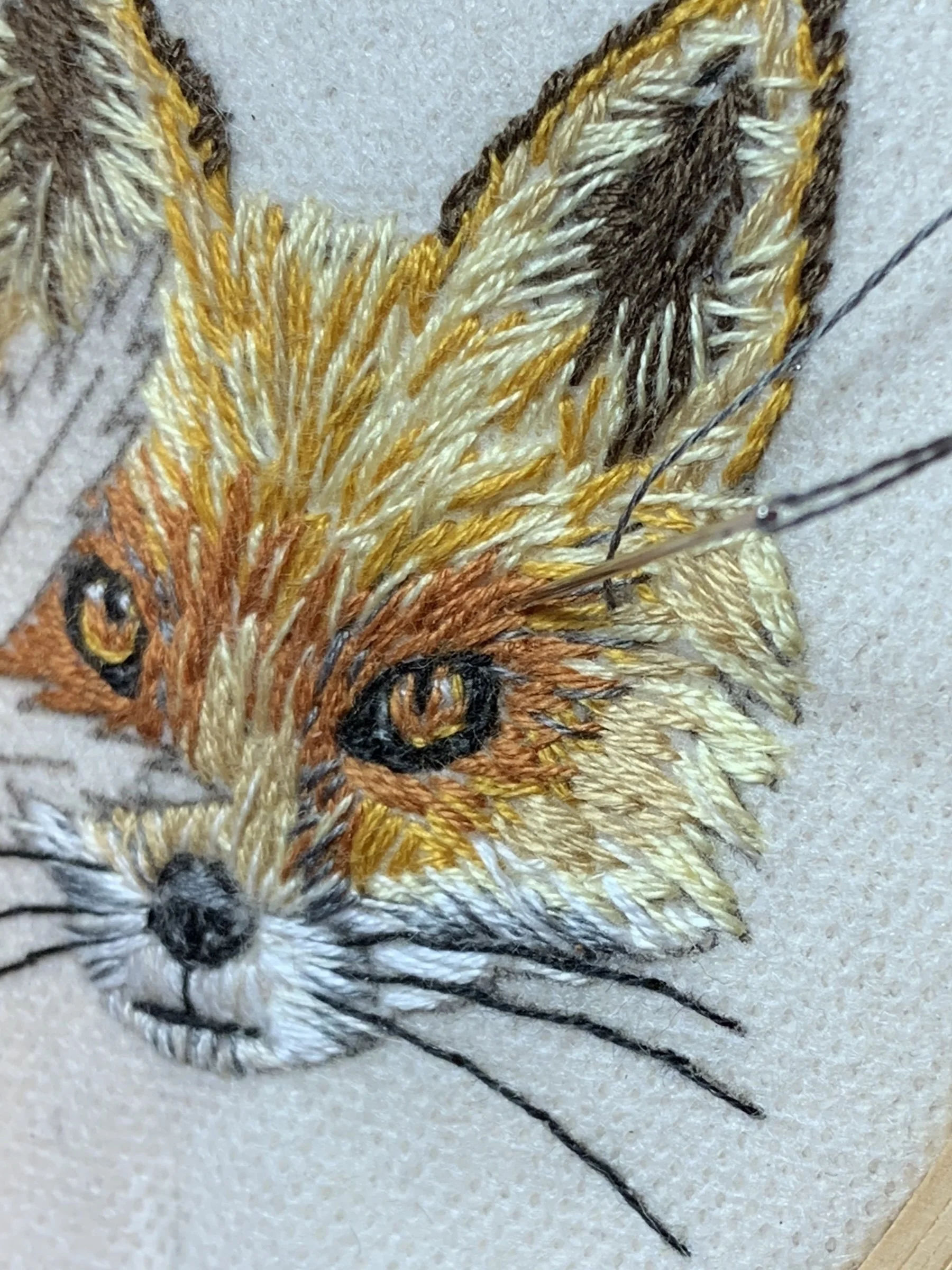 embroidery stitching of Naure-inspired fox and leaf embroidery.jpeg