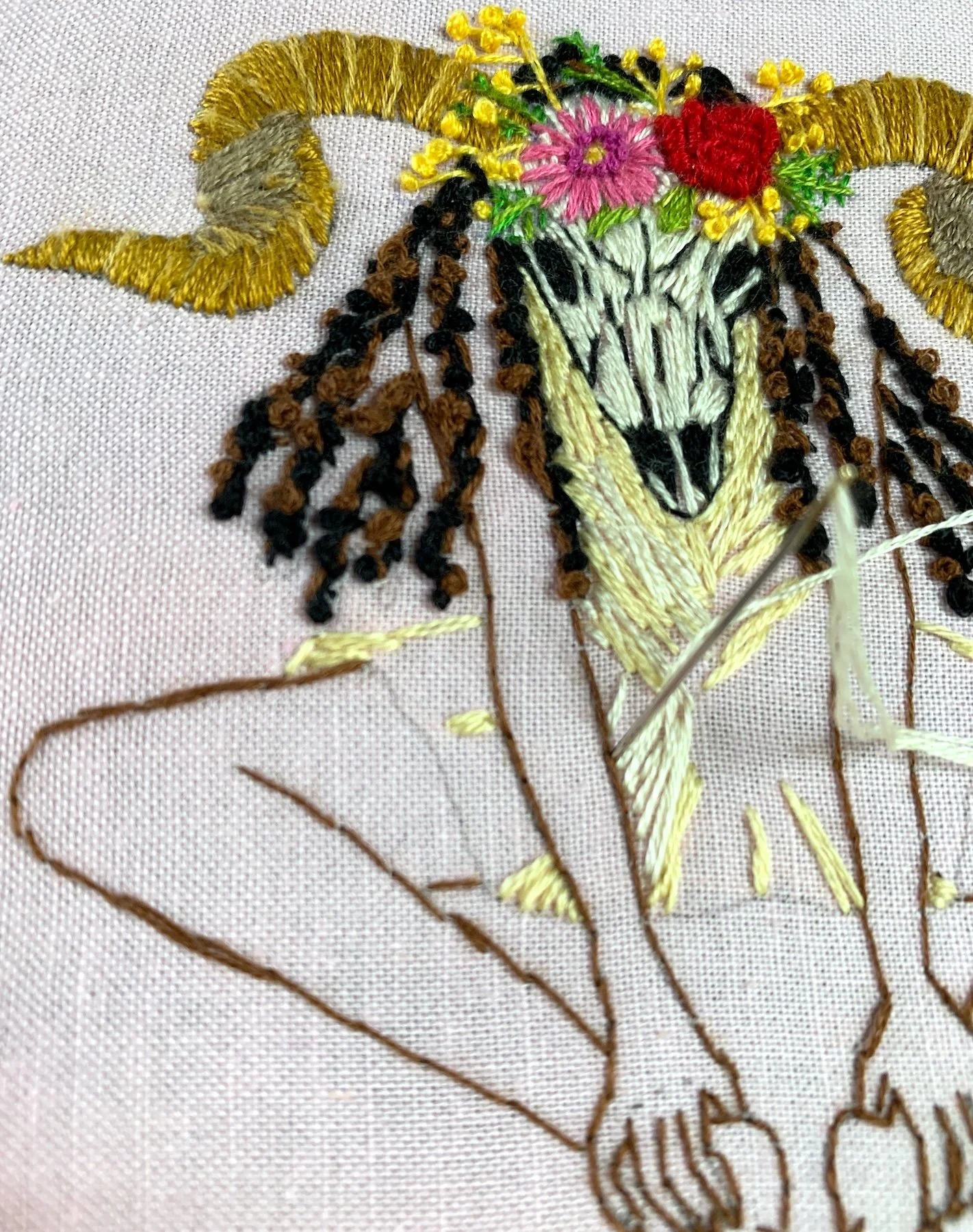 closed up to the stitches of Aries embroidery.jpg