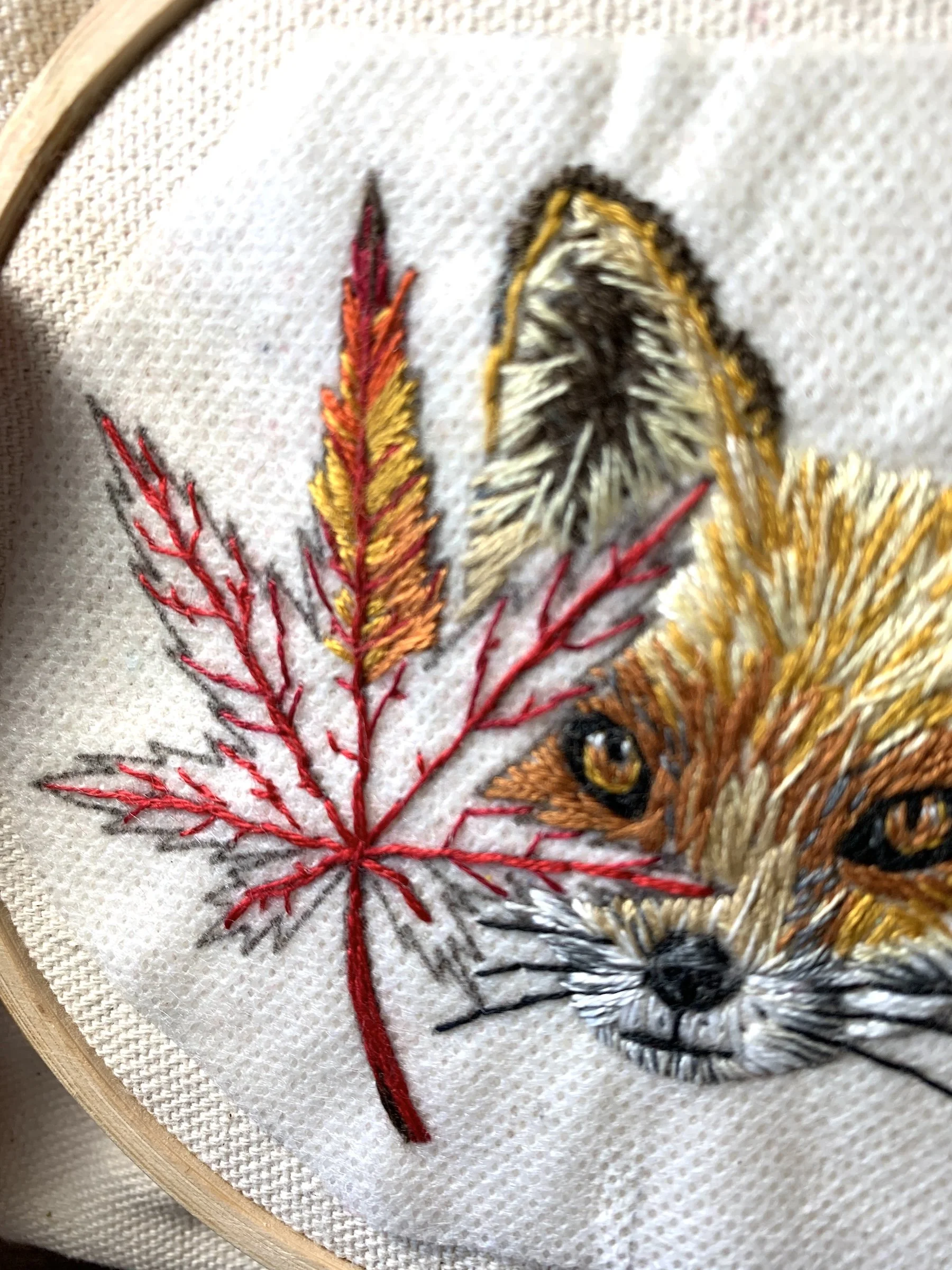 Close up to embroidery stitch on Maple leaf of Fox and Leaf stick and stitch.jpeg