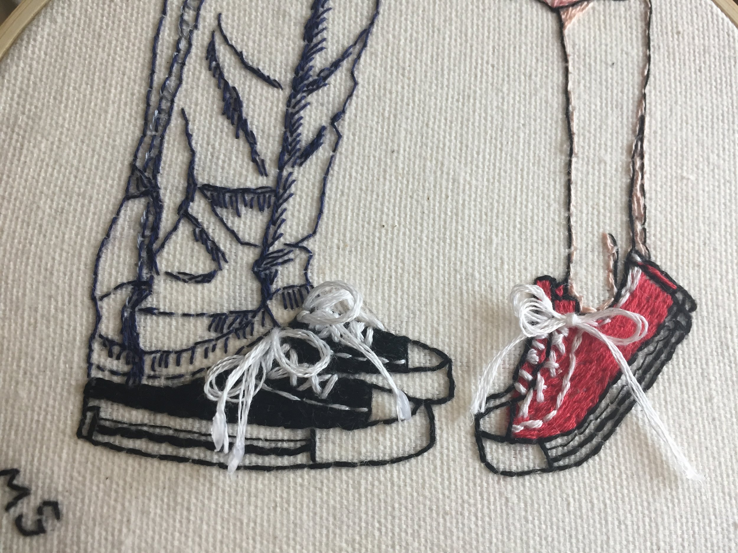 close-up to sneaker stitching on "Boy and Girl" embroidery.jpeg