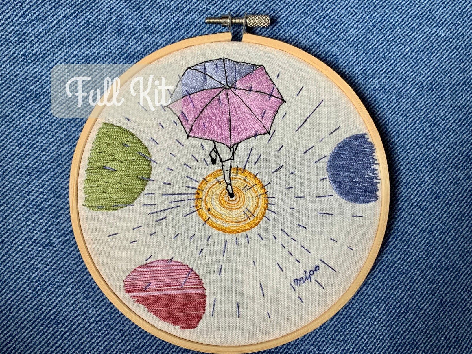 Beginner embroidery kit featuring umbrella and rain puddle design.jpg