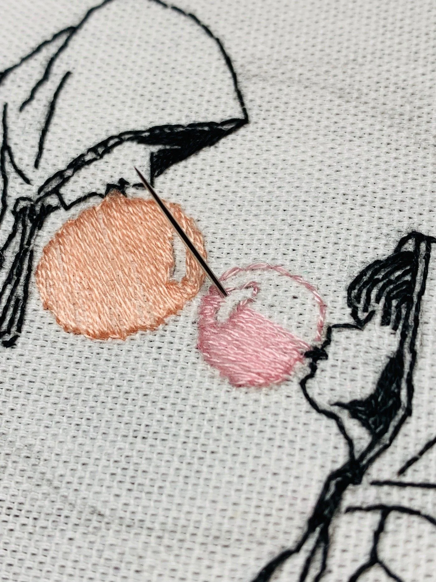 close up of bubblegums being stitched with satin stitch.jpeg