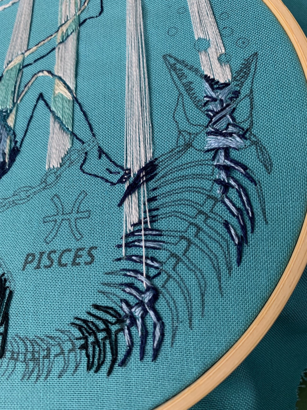 Pisces embroidery process fish skelton .jpeg