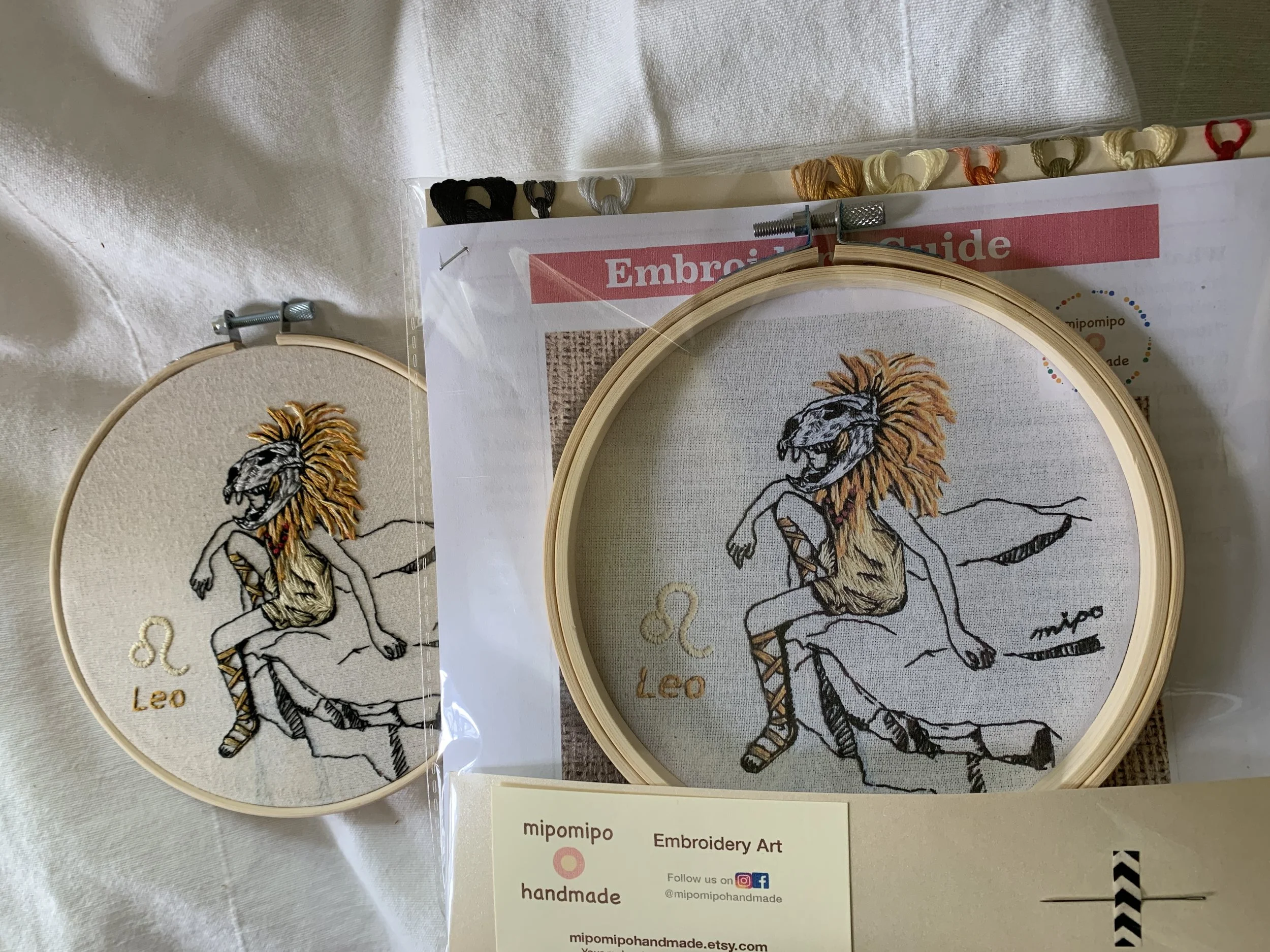Product package of Leo zodiac embroidery kit with printied fabric.jpeg