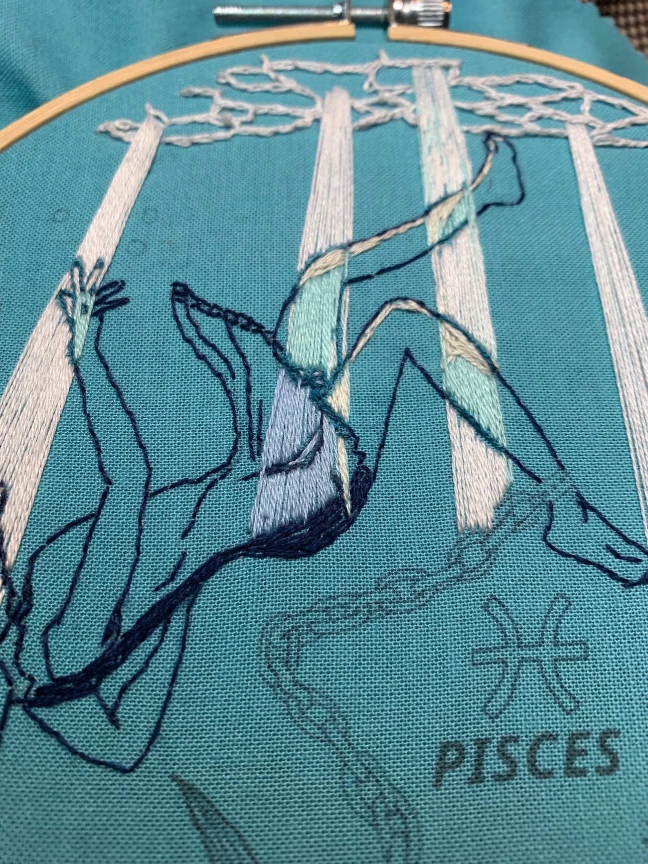Pisces embroidery process straight stitch for light coming from the water surfacejpeg