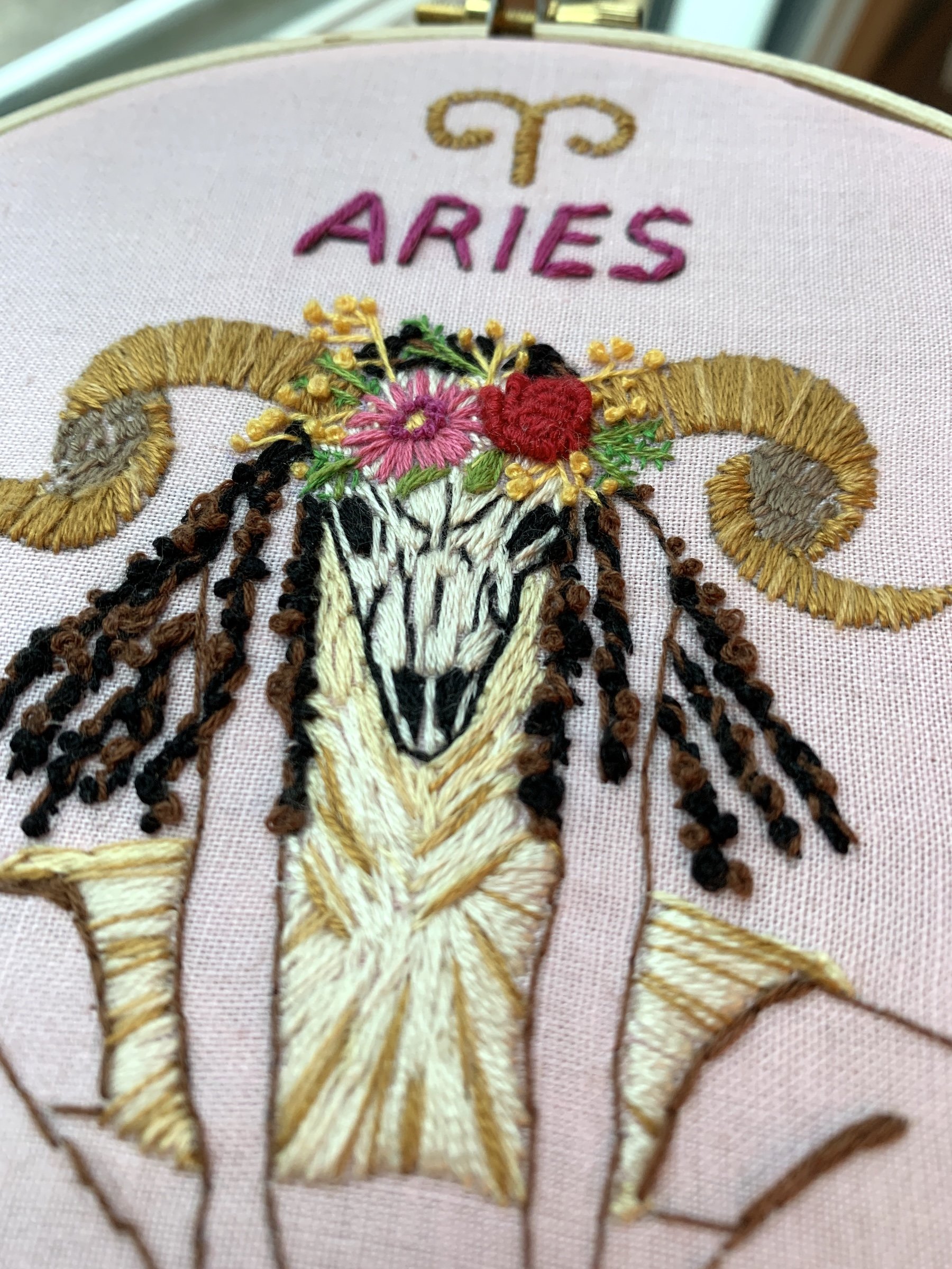 closed up view of Zodiac girl dark embroidery.jpeg