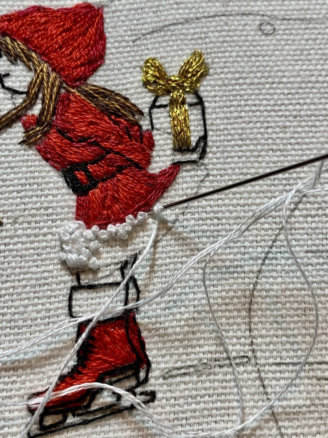 French knot demonstration on Santa girl and snowman embroidery