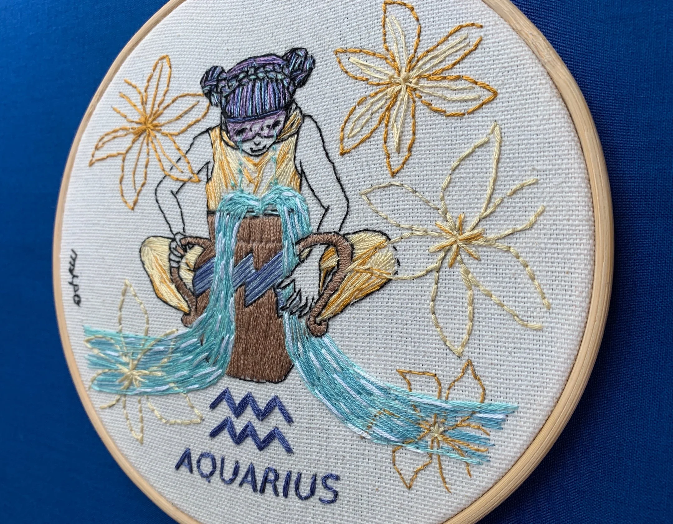 angle view of aquarius zodiac girl embroidery hoop.jpeg