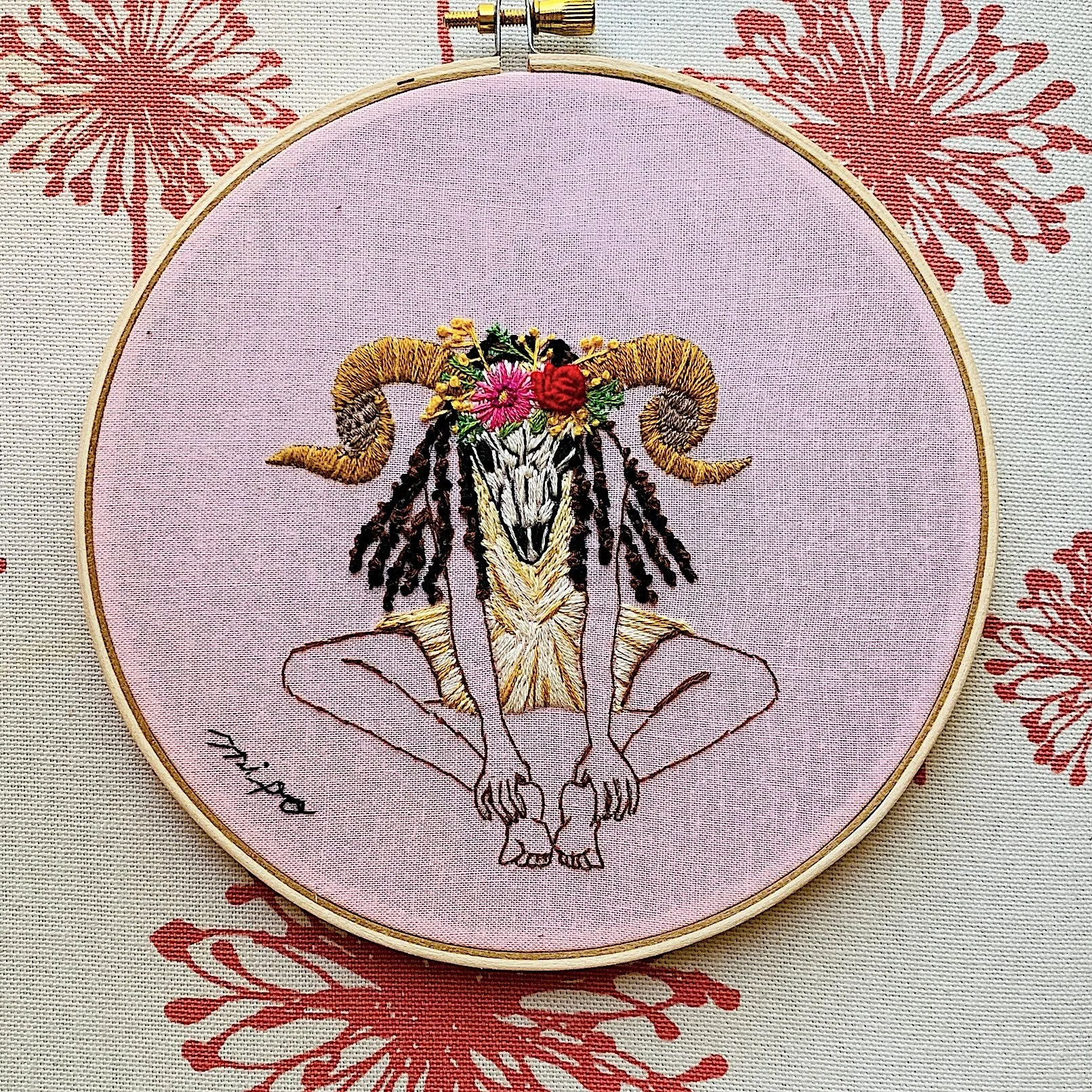 Animal skull zodiac embroidery Aries pink fabric.jpeg