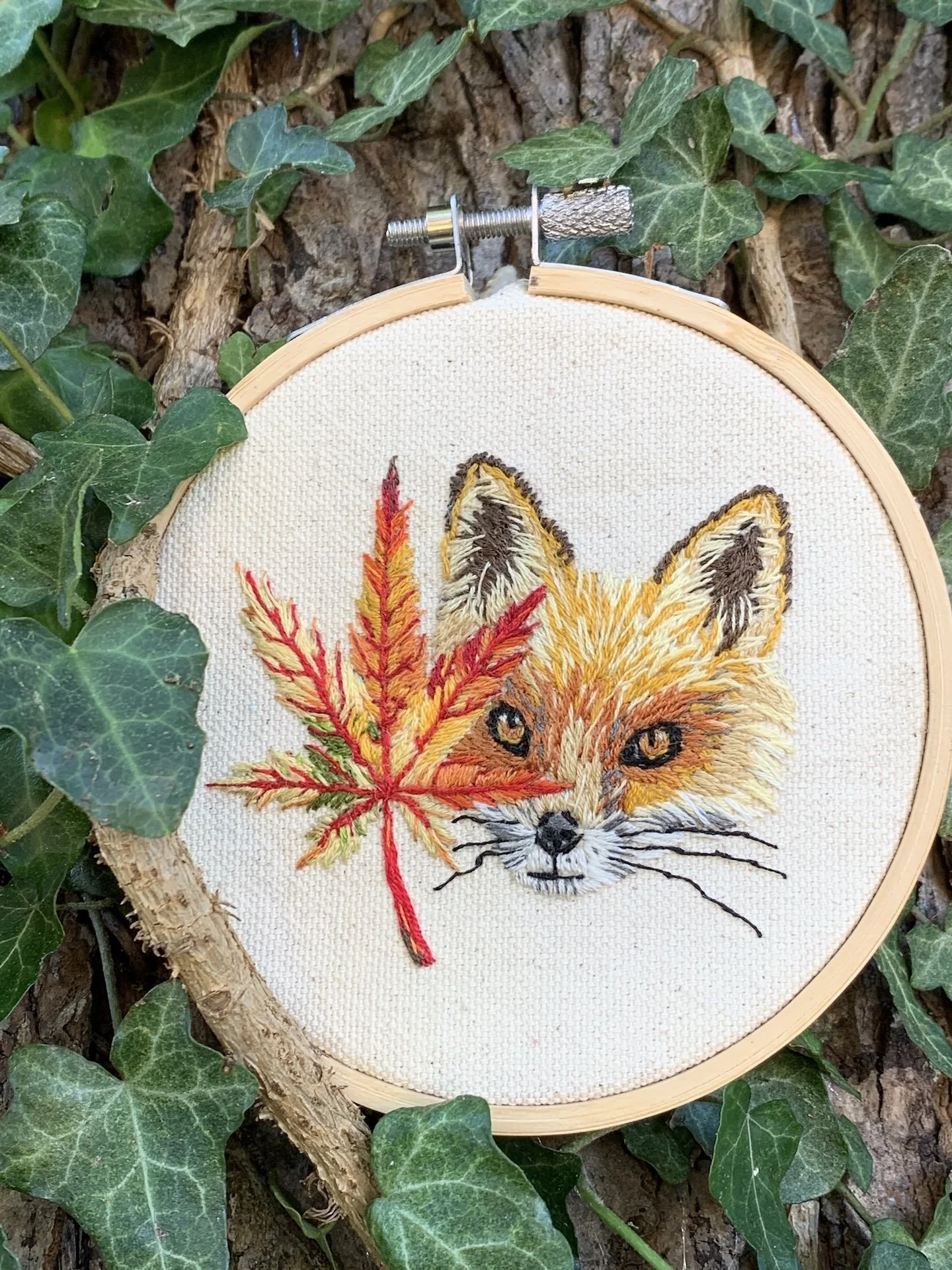 Autumn fox embroidery design with falling leaves  .jpeg