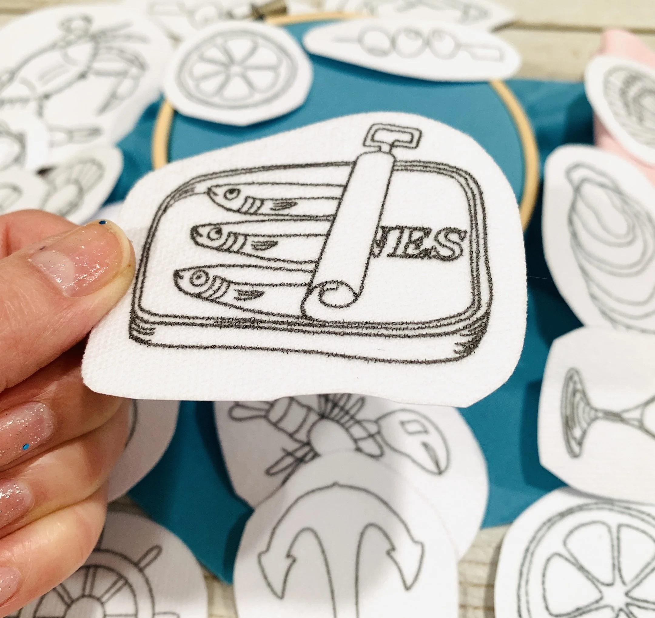 Sardine embroidery stick & patch placing on fabric