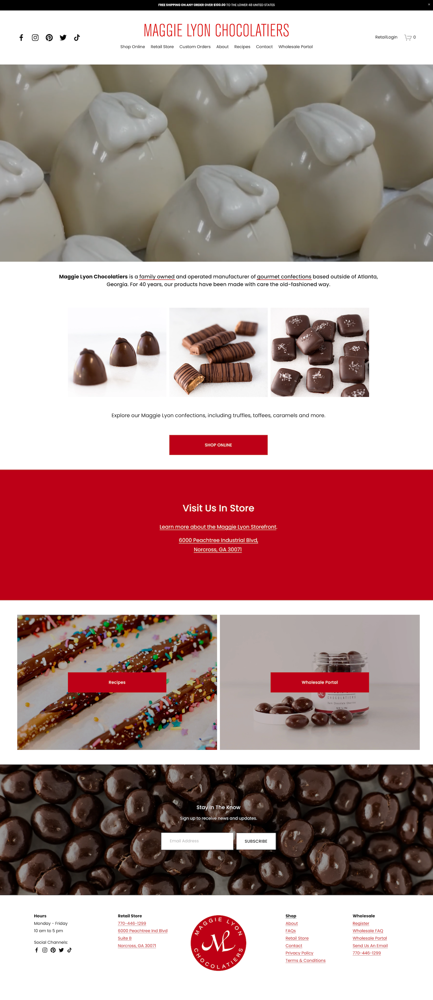 Close-up of white chocolate truffles with a dollop of white chocolate on top.