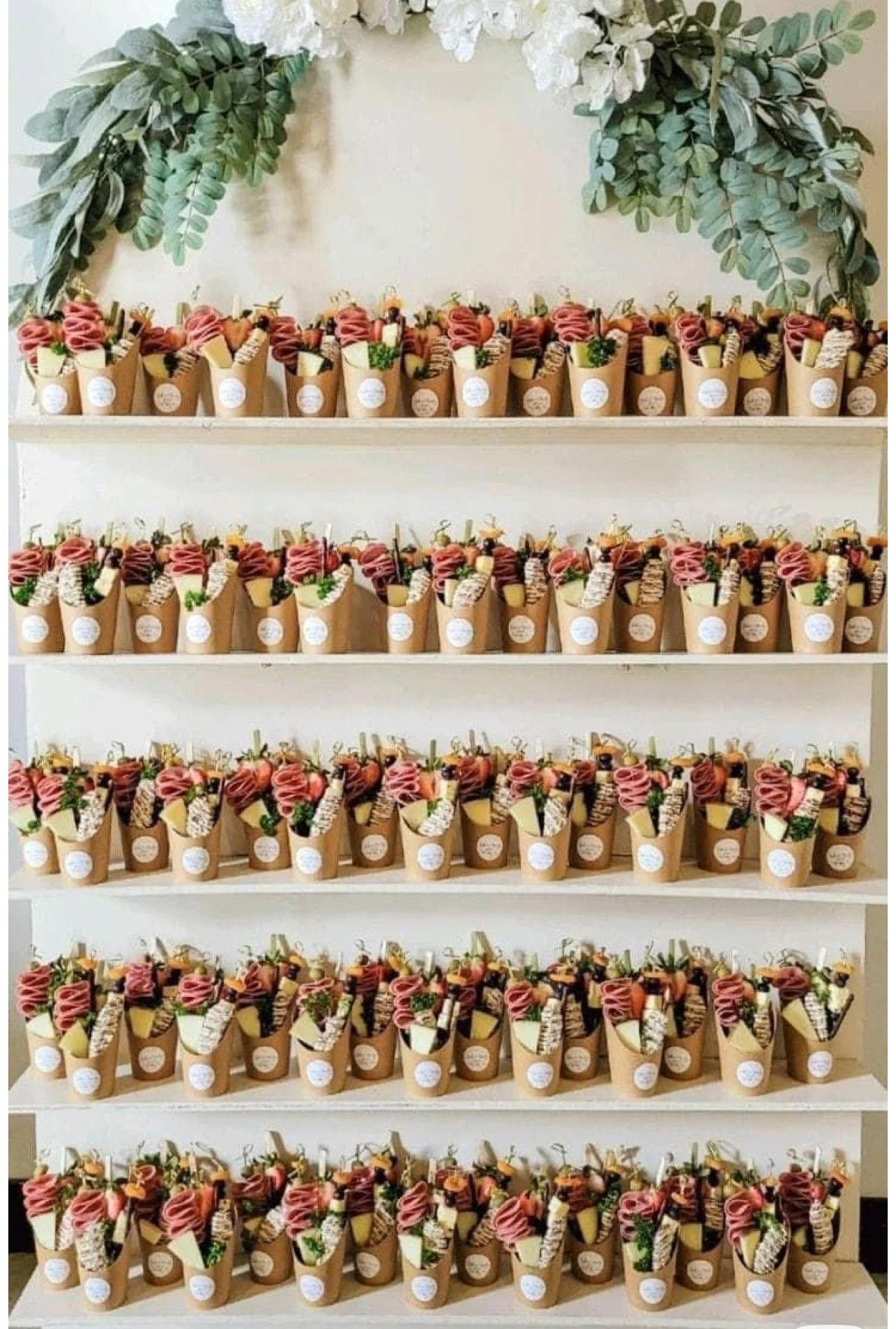 Individually Curated Charcuterie Cups on Display for a Wedding Reception as a guest favor. 