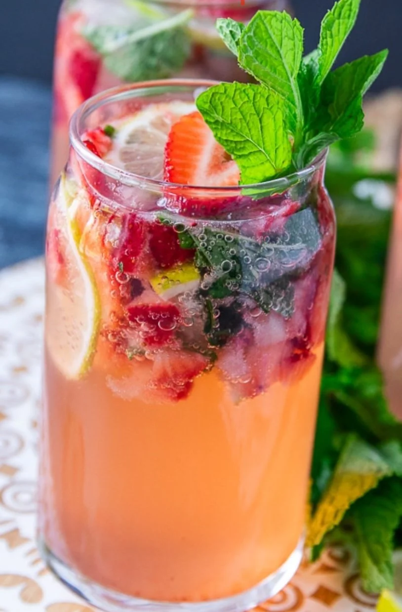 Seasonal Mojito with fresh mint, lemon, lime and fresh garnishes