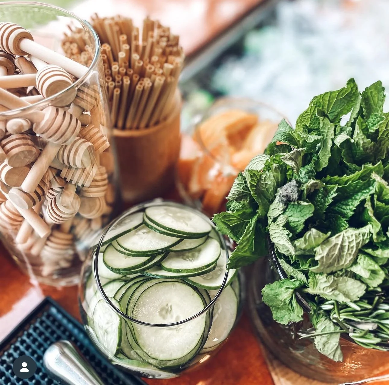 Eco Bar Garnishes including agave straws, honey sticks, fresh cucumbers and fresh mint