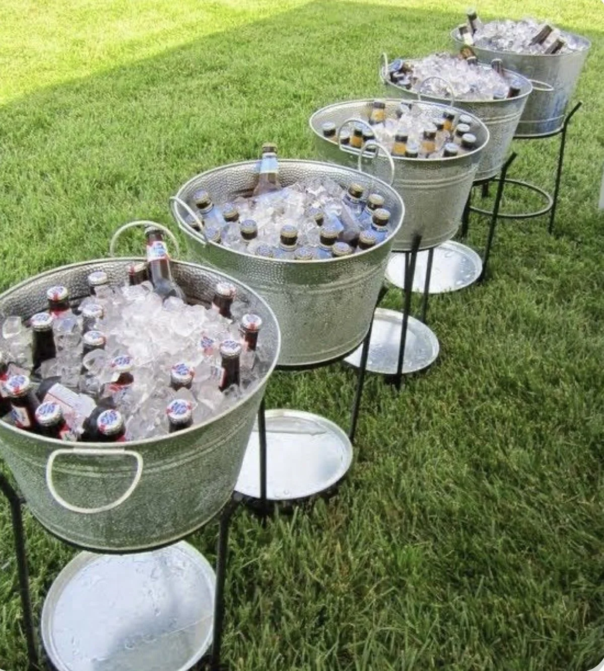 Galvanized beverage buckets on stands for special event rentals