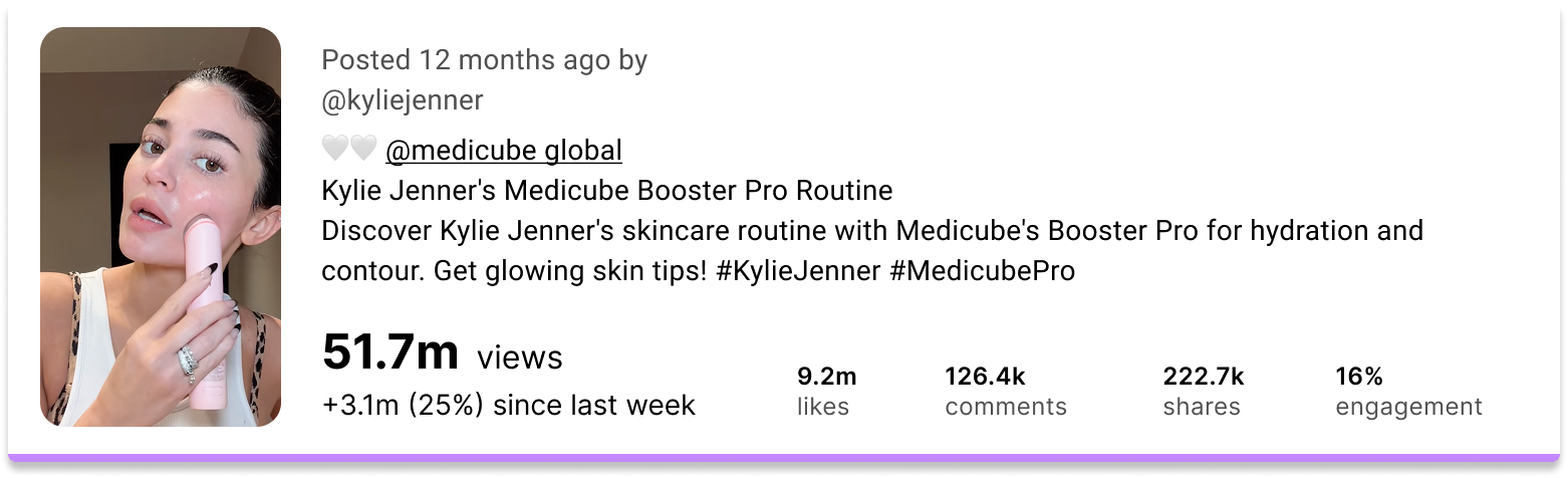 Kylie Jenner demonstrating her skincare routine with a handheld device.