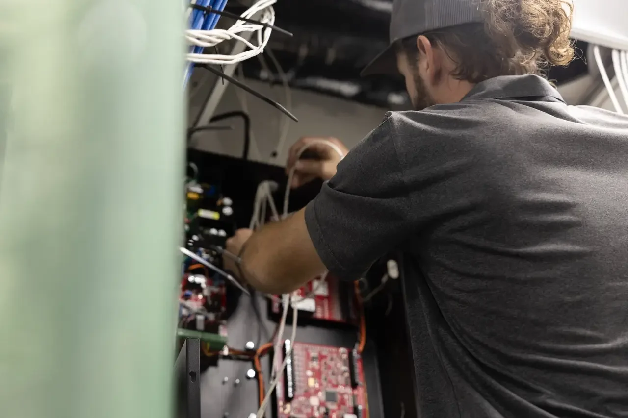 Technician working cable