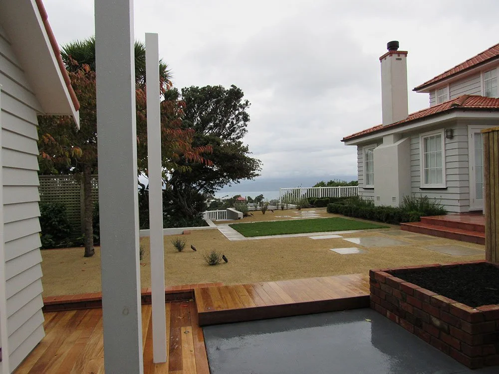 1i-Karori---Full-Landscape---Paving,-coloured-concrete,-ready-lawn,-limestone,-timber-boardwalk-and-deck,-coloured-concrete-and-brick-planter.jpg