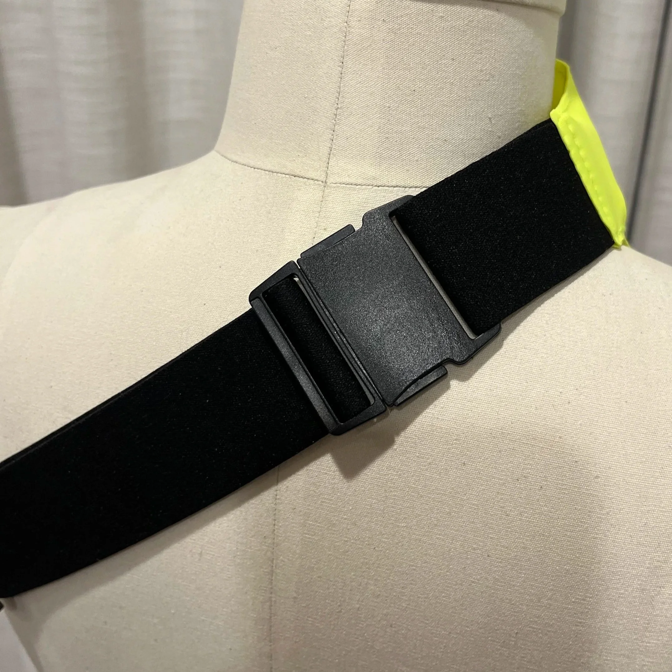 Resilient clip for waist pack