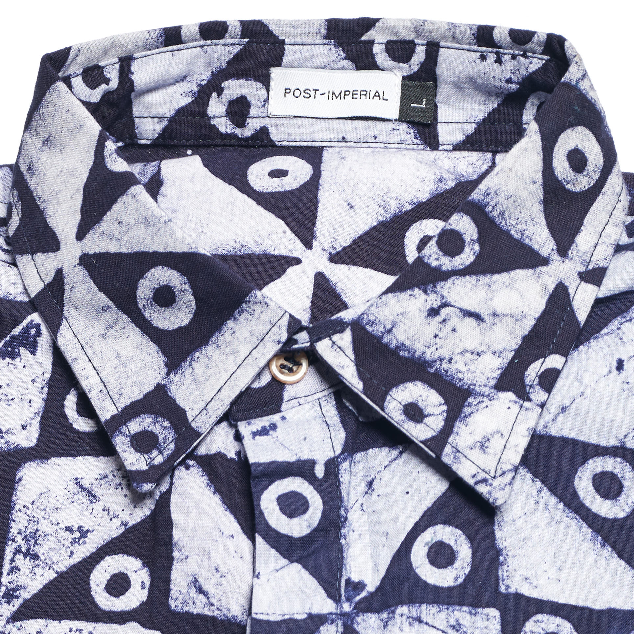 POST-IMPERIAL LAGOS LONG SLEEVE SHIRT TALKING DRUM INDIGO-MILK (DETAIL).png