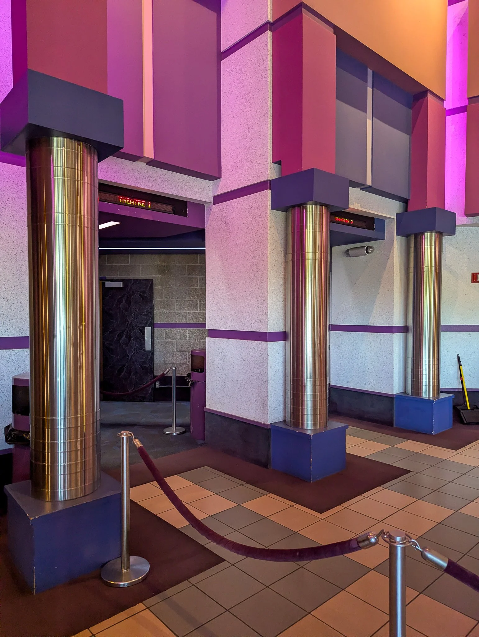 Empty concession stand counter at Deer Park Cinema with Pepsi drinks and a menu board overhead.