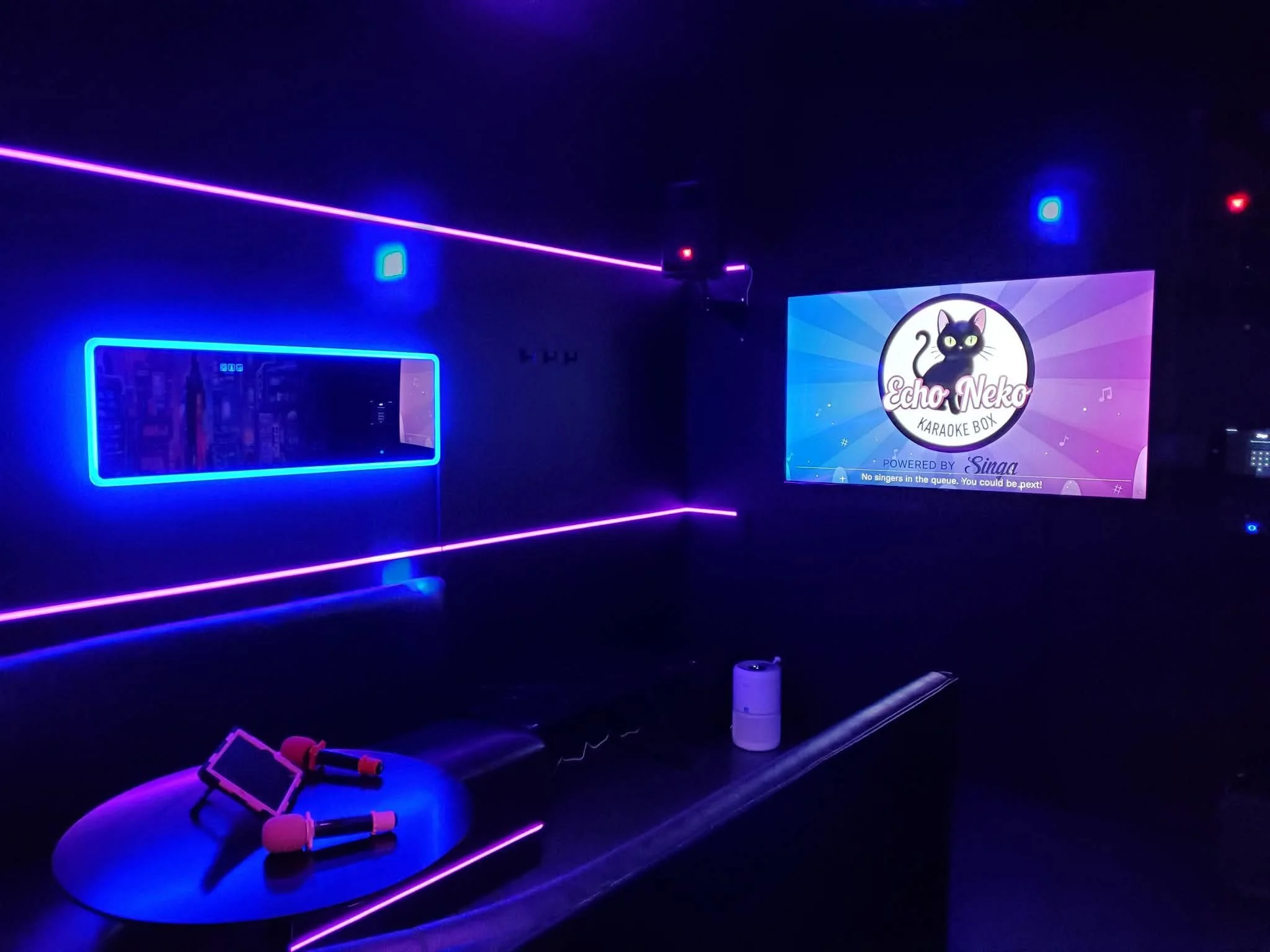 A neon lit karaoke private room at Echo Neko in Port Angeles, WA.
