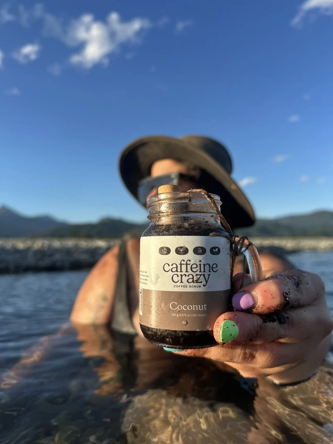 Handcrafted all-natural coffee scrub being enjoyed in Marlborough, Wairau Valley River.