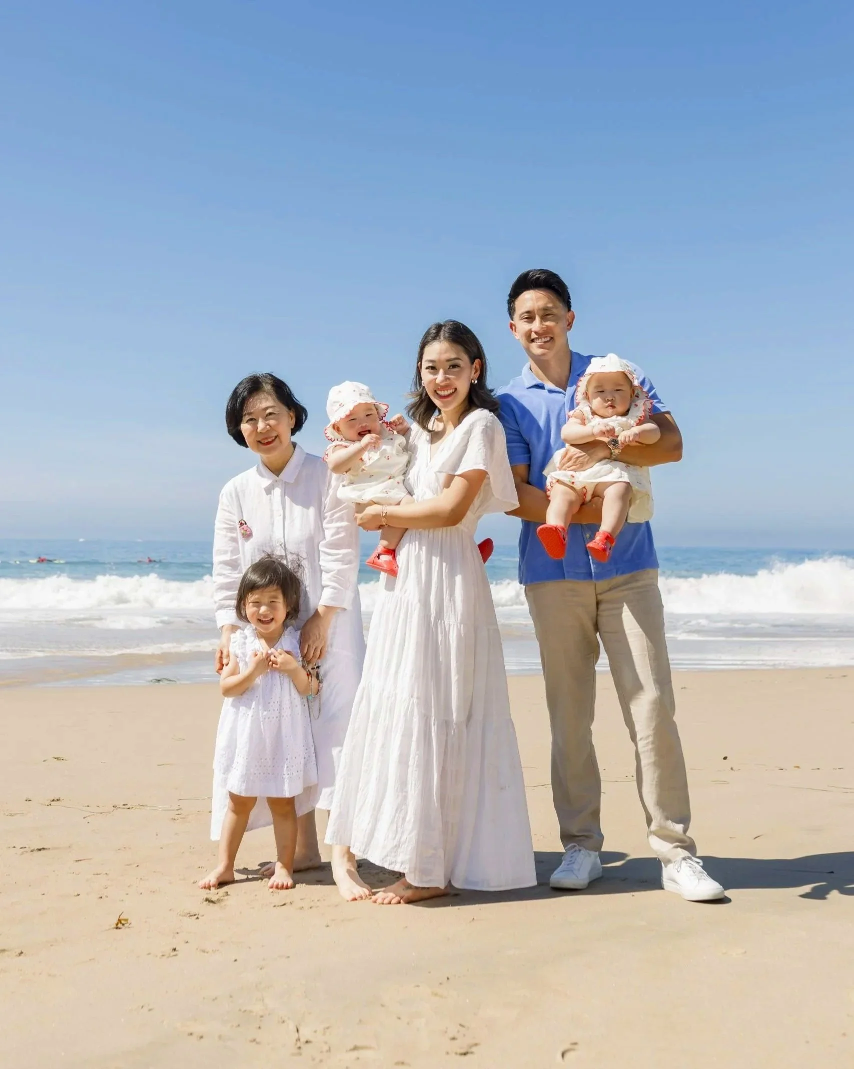 Dr. Jae Kwak, pediatric dentist with her family and husband. Trusted and top rated children's dentist in orange county, CA