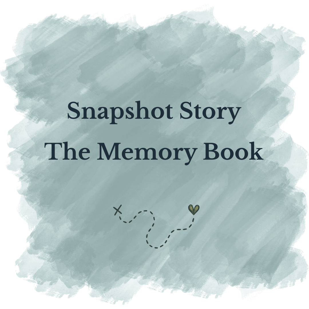 A digital illustration with a soft blue watercolor background featuring the text 'Snapshot Story The Memory Book' in dark blue font. Small decorative elements include a dashed line with a star on one end and a heart on the other.