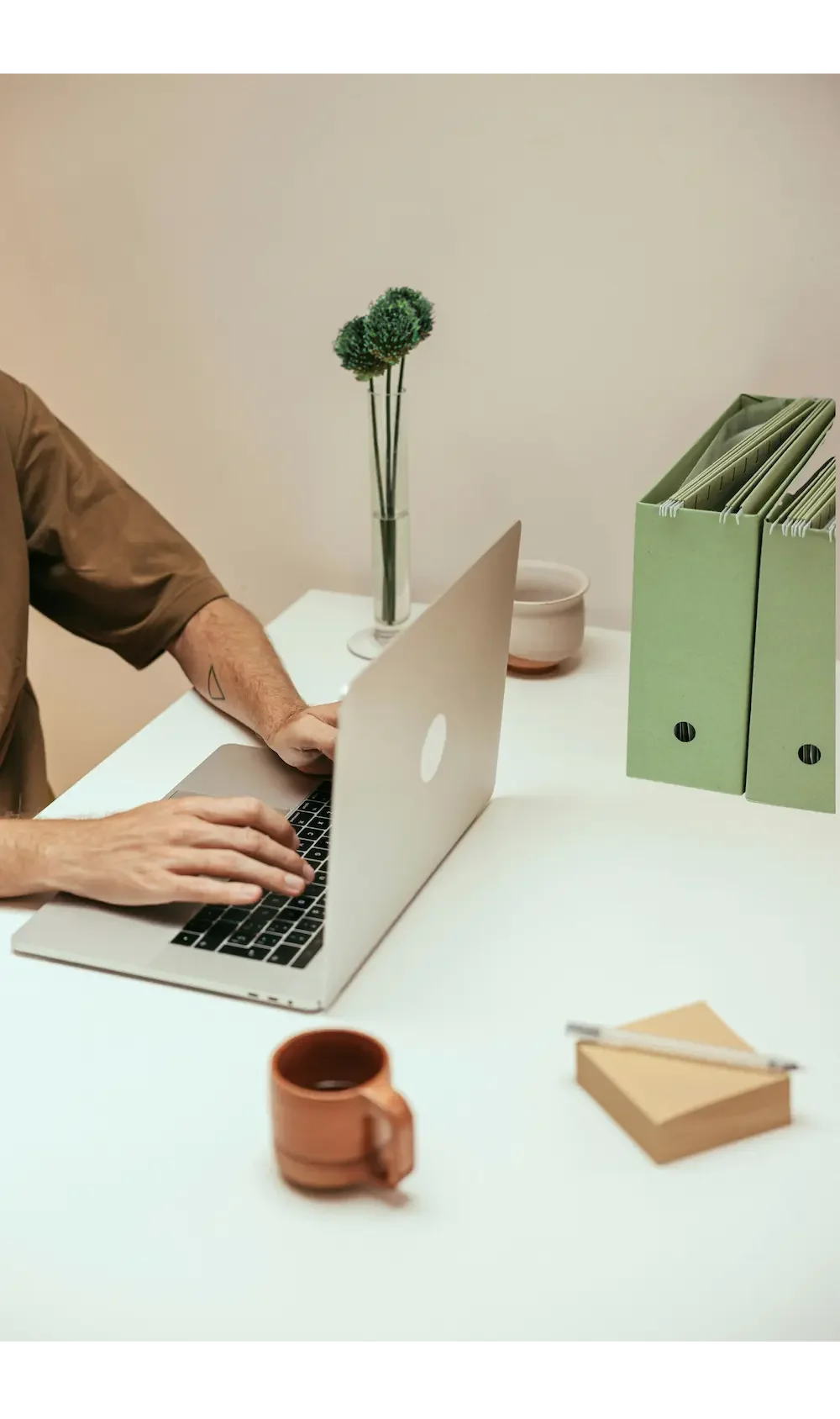 man on computer working at desk