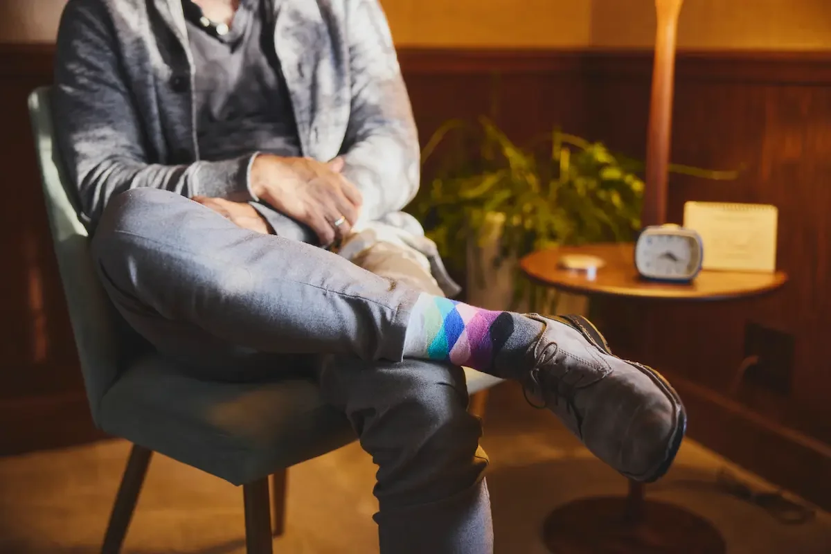 Male therapist providing online therapy for men experiencing stress and burnout in California