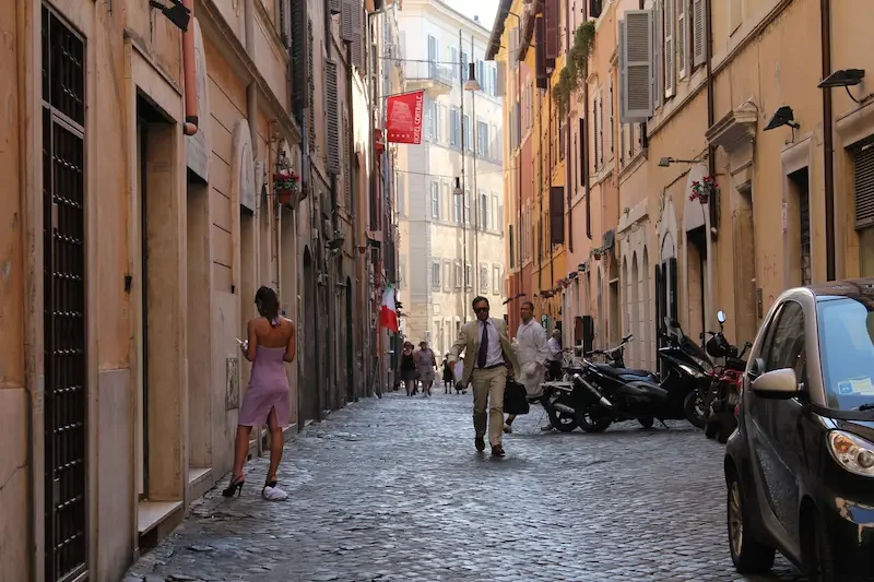 Street life and people walking in Rome Italy