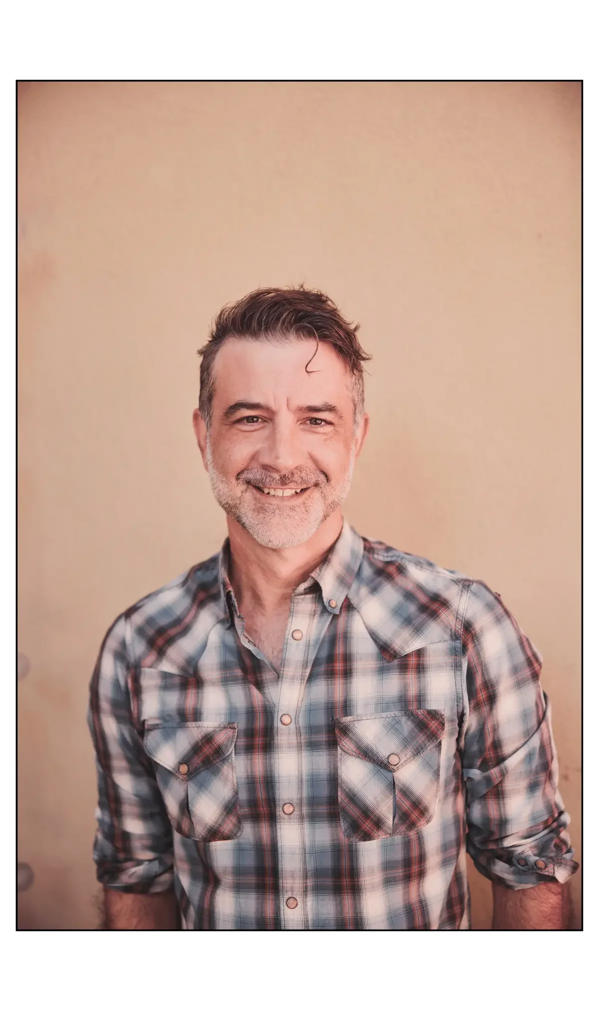 Male therapist specializing in burnout and midlife crisis therapy for men in California