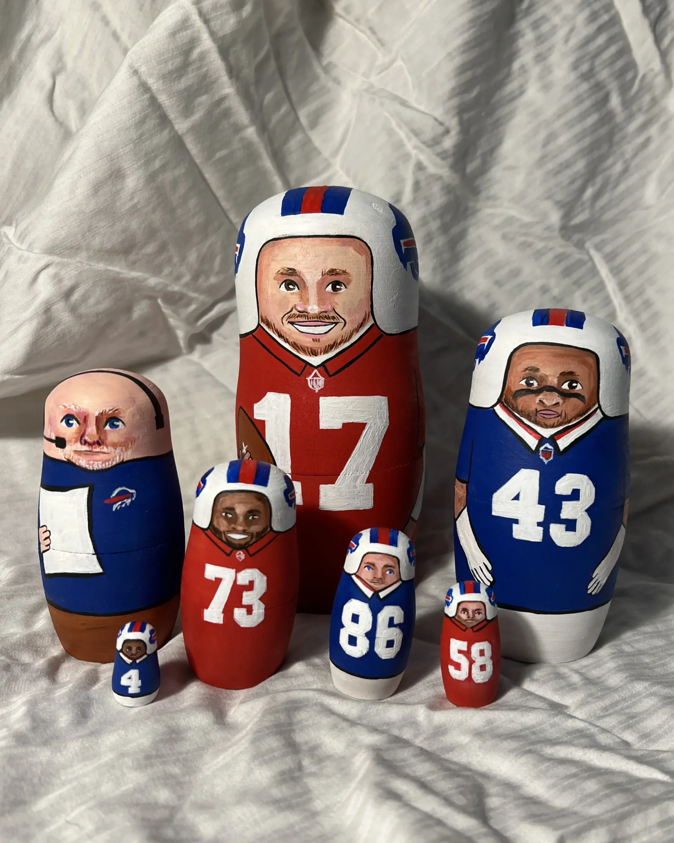 Hand_painted_Russian_Nesting_Dolls_Set_Buffalo_Bills_2.webp