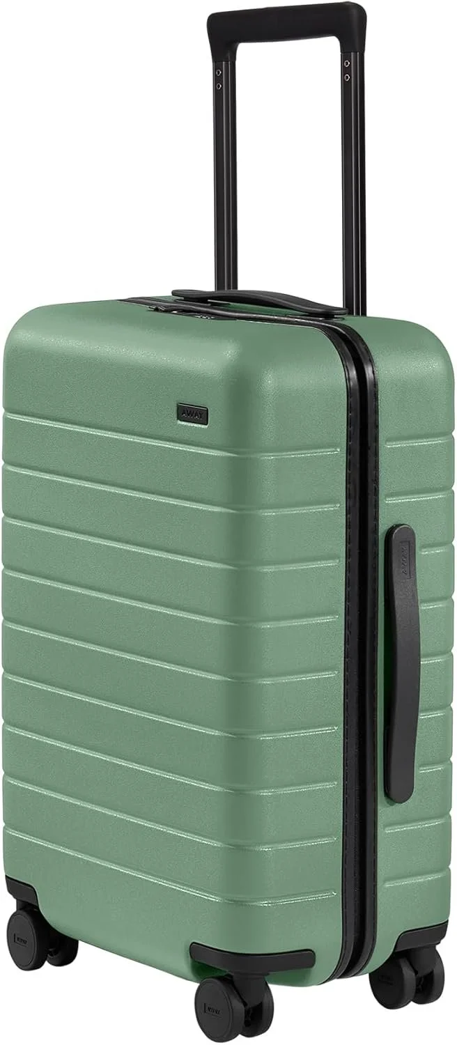 Green hard-shell rolling suitcase with black handle and wheels on a white background.