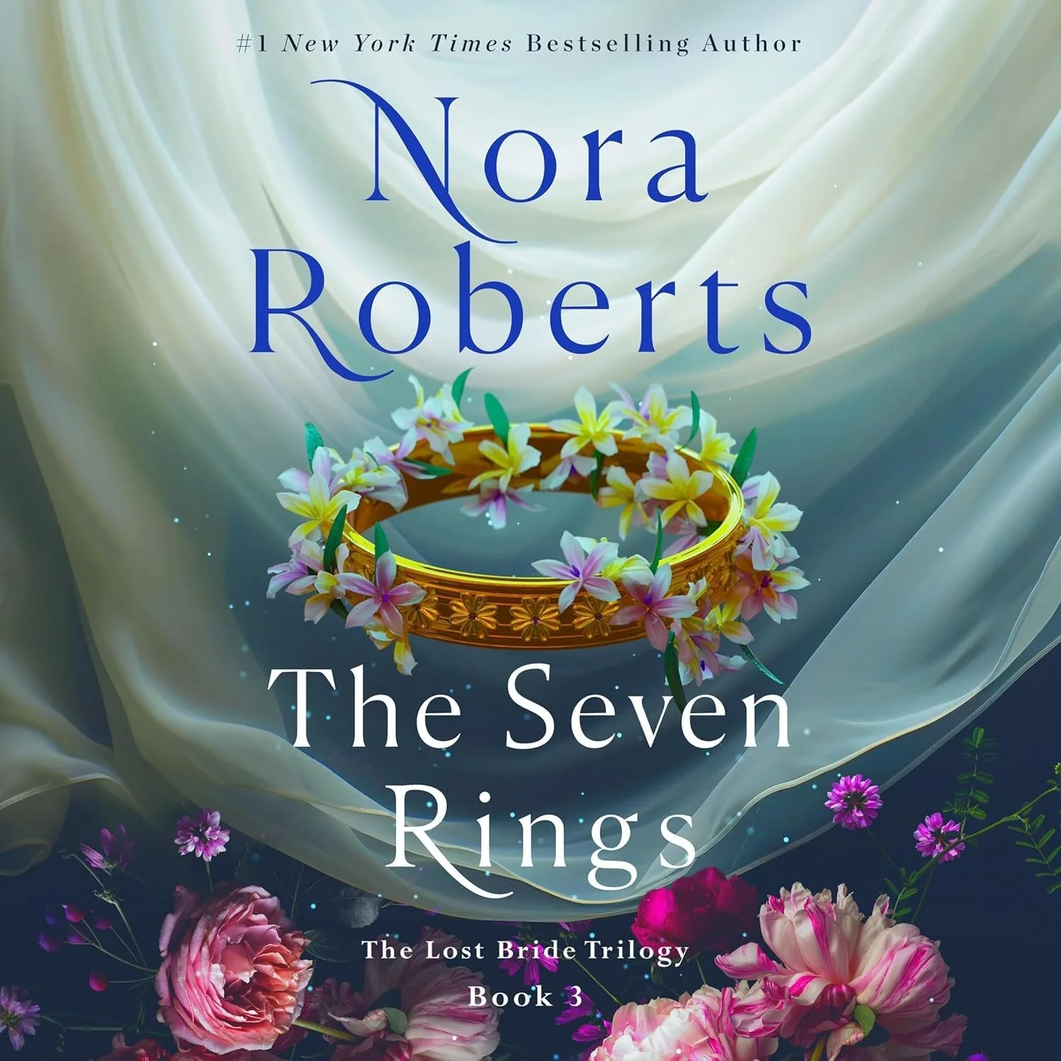 Book cover for 'The Seven Rings' by Nora Roberts, part of 'The Lost Bride Trilogy, Book 3'. Features a gold ring with flowers and a flowing fabric background.