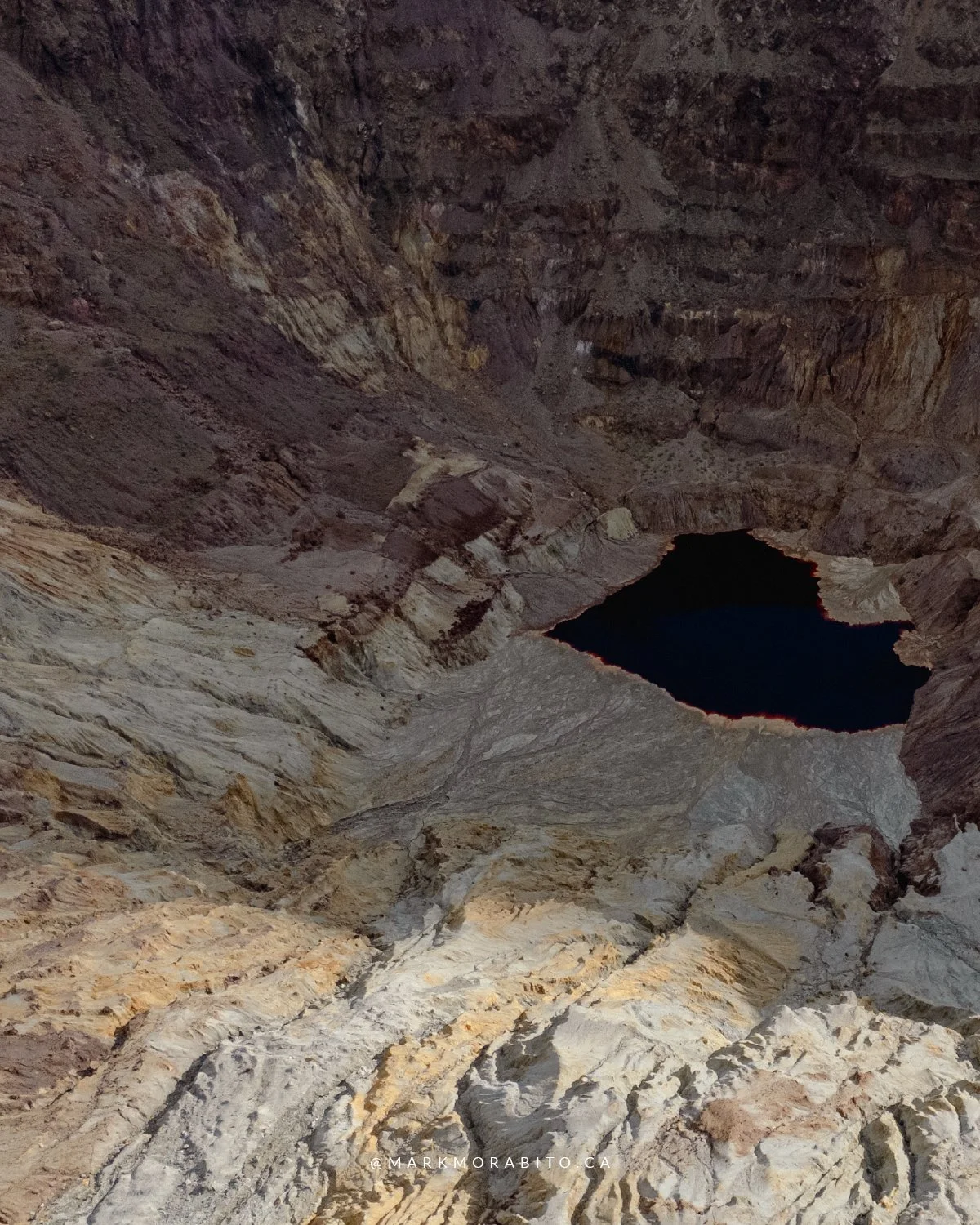 The Lavender Pit in Bisbee, Arizona is one of those places that stays with you. An old open-pit copper mine carved across decades, its scale hitting you the moment you see it.

Down at the bottom, there&rsquo;s a small pool shaped like a heart &mdash