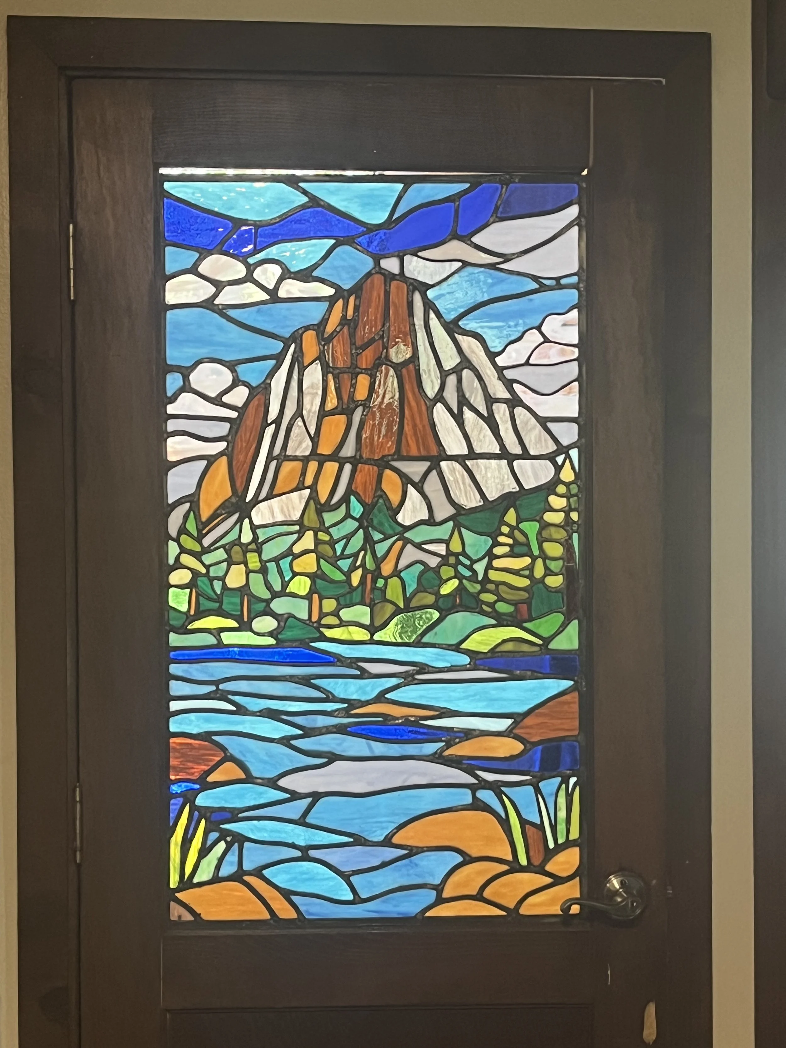 Custom commission for landscape window in an external-opening hallway/back door
