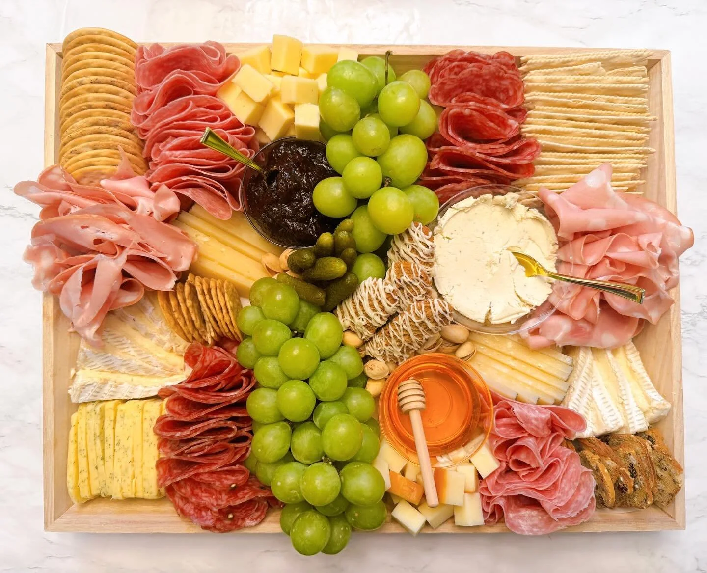 Celebrate this month long week with a little snacky snack!! 🧀🍇🫒