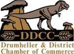 Logo for the Drumheller & District Chamber of Commerce featuring a dinosaur and the acronym DDCC.