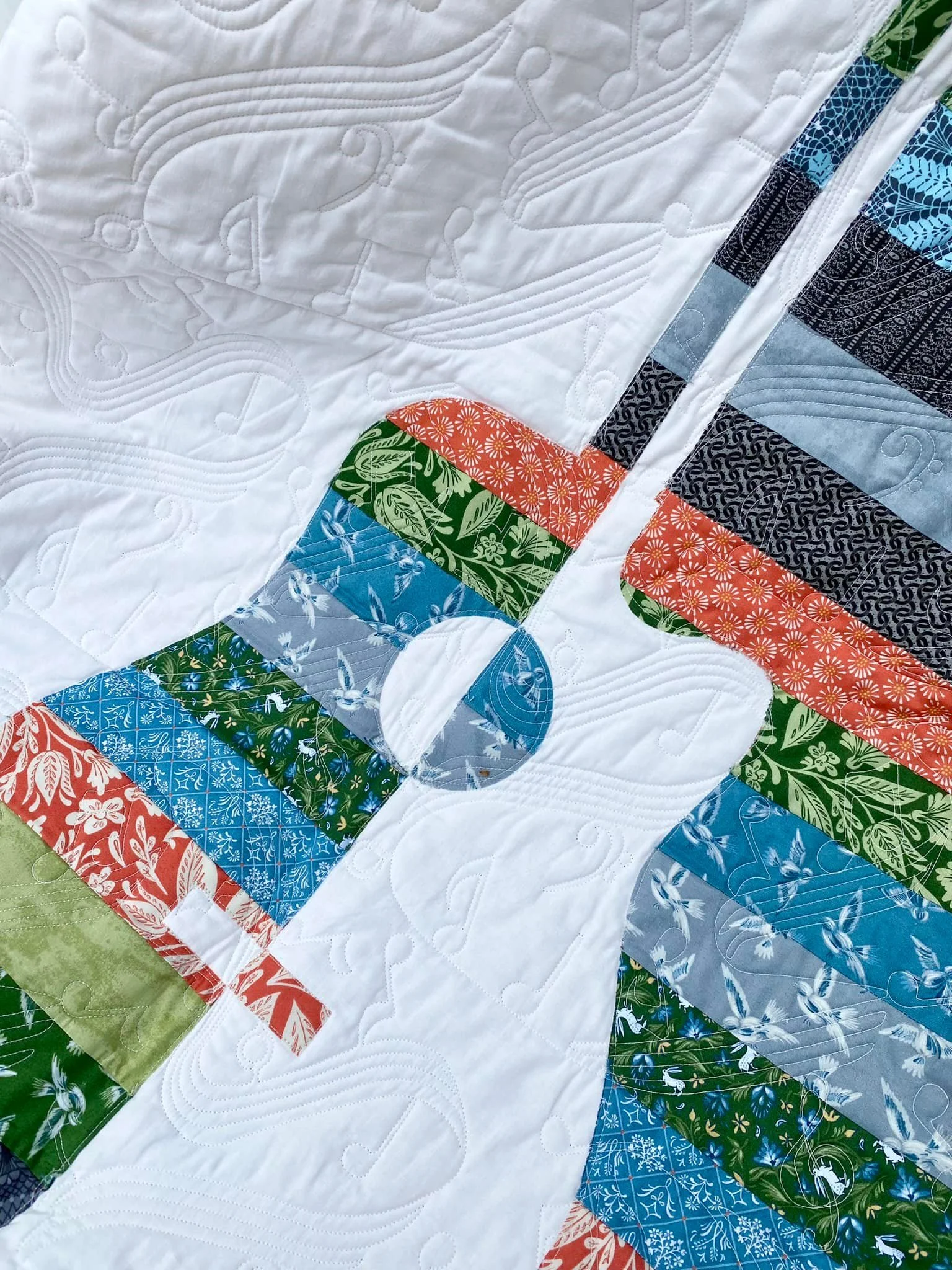 quilt-guitar-music-note-stitching.jpg
