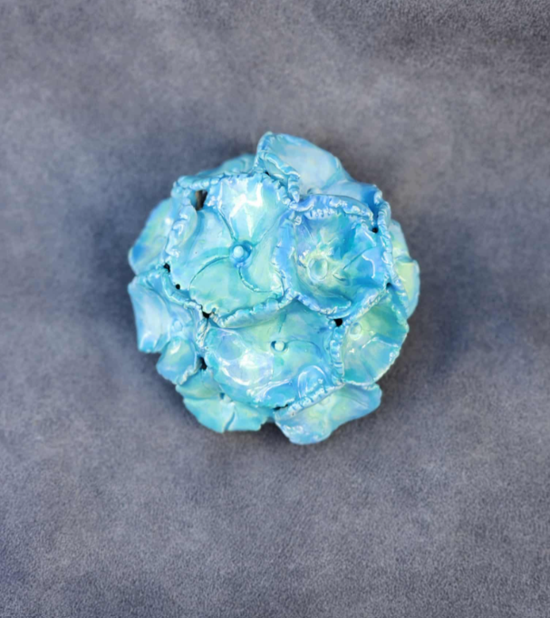 Small blue and green frilley hydrangea.png