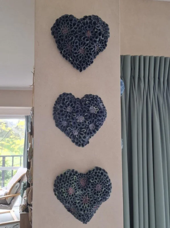 Heart shaped dahlias on wall.jpg