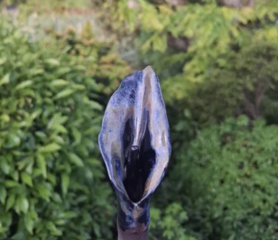 Calla Lily in black clay with deep blue.jpg