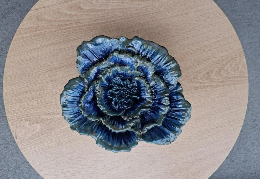 Blue & green flower on table.jpg
