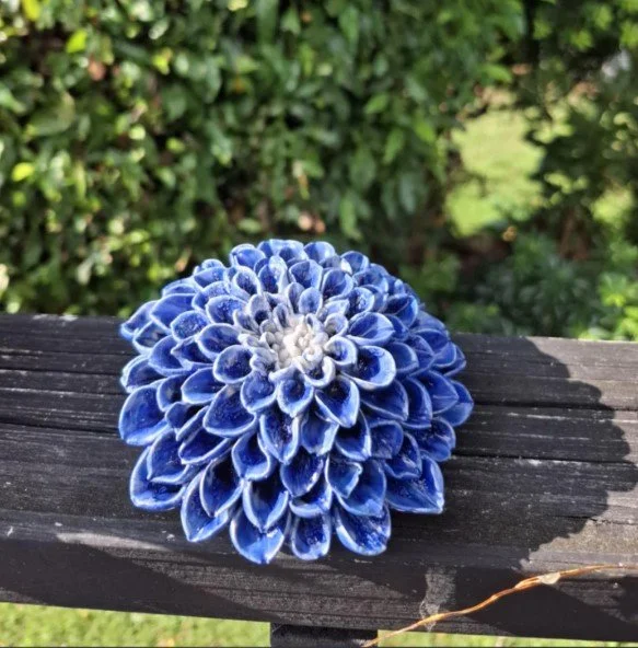 Small bright blue dahlia deck.jpg